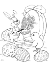 Easter bunny decorates a big egg, standing at his left side. His left hand holds a paint pallet, and his right hand holds the paint brush.
At the other side of the egg stands a little chicken. there are 4 decorated eggs on the grass around them.